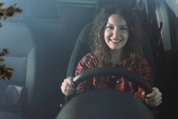 istock Woman driving a car 864508118
