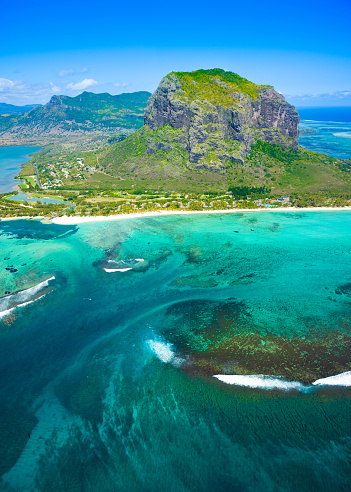 Aerial view of Mauritius island panorama and famous  Le Morne Brabant mountain, beautiful blue lagoon and underwater waterfall