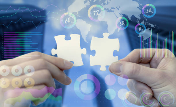 istock two pieces of jigsaw puzzle and various business information. 864511676