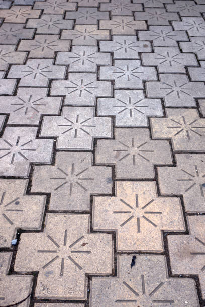 istock Stone pavement pattern of an urban street 864525800