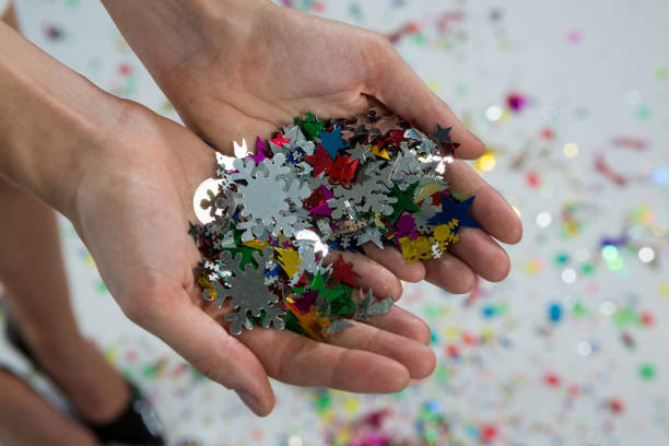 istock Woman holding snowflakes in hands 864526726