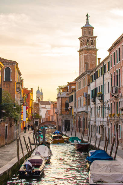 istock Sunset view with canal in Venice, Italy 864529134