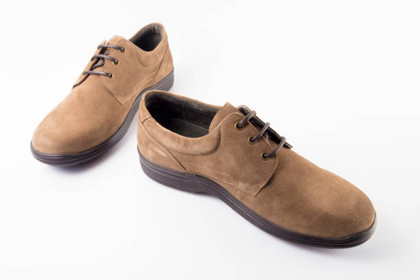 istock Male brown leather shoe on white background 864530778