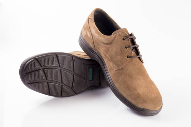 istock Male brown leather shoe on white background 864530806