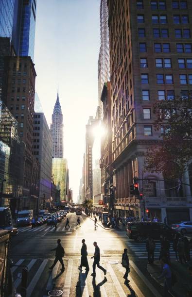 sunrise manhattan workers silhouette chrysler building 5th av