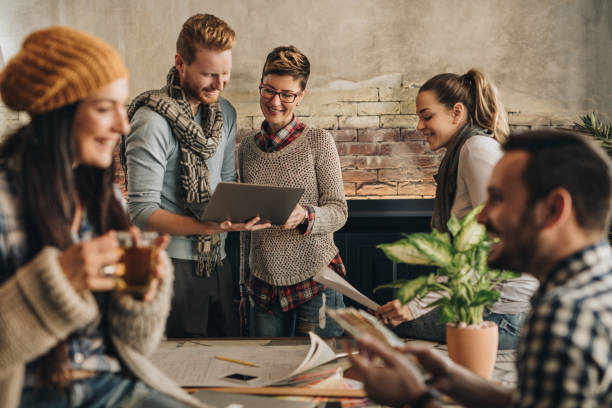 istock Group of young creative business people working in the office. 864531644