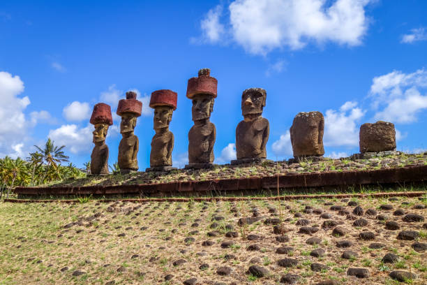 istock Moais statues site ahu Nao Nao on anakena beach, easter island 864531744