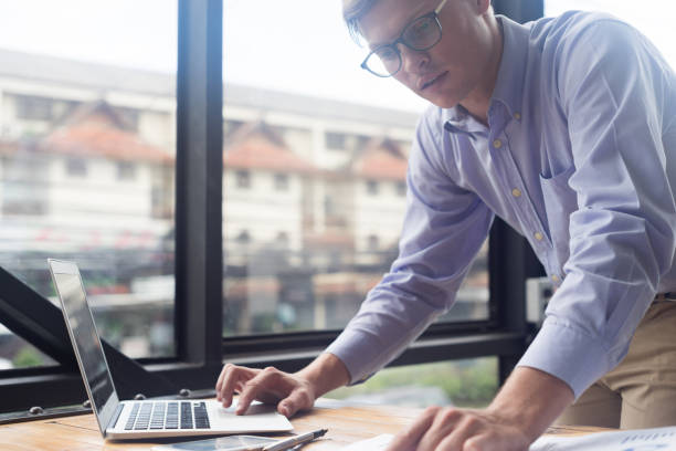 istock smart businessman work with laptop in office 864536460