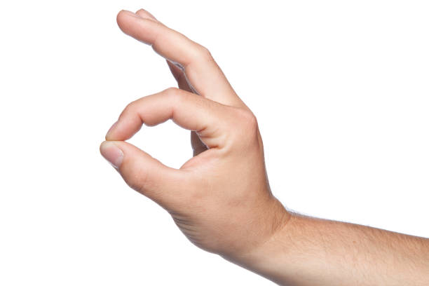 istock a little something, a gesture with his hand on a white background 864537024