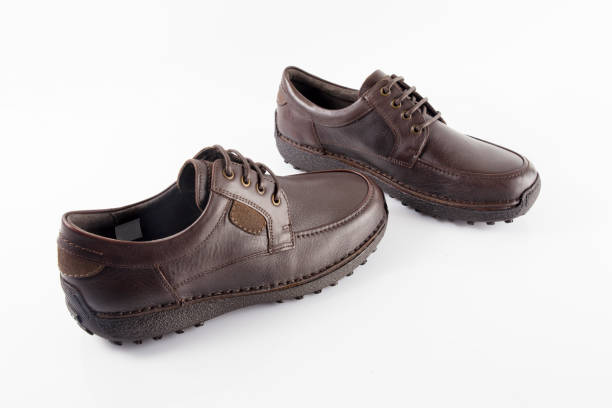 istock Male brown leather shoe on white background 864541698