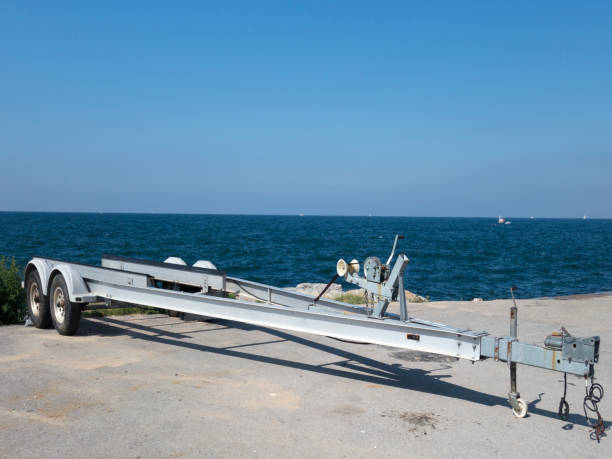istock Boat Trailer with Trucks near sea 864542688