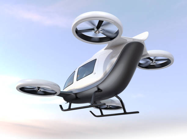 White self-driving passenger drone flying in the sky White self-driving passenger drone flying in the sky. 3D rendering image. tilt rotor stock pictures, royalty-free photos & images