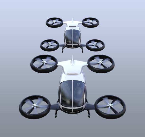 Front view of two self-driving passenger drones flying in the sky Front view of two self-driving passenger drones flying in the sky. 3D rendering image. upward mobility stock pictures, royalty-free photos & images