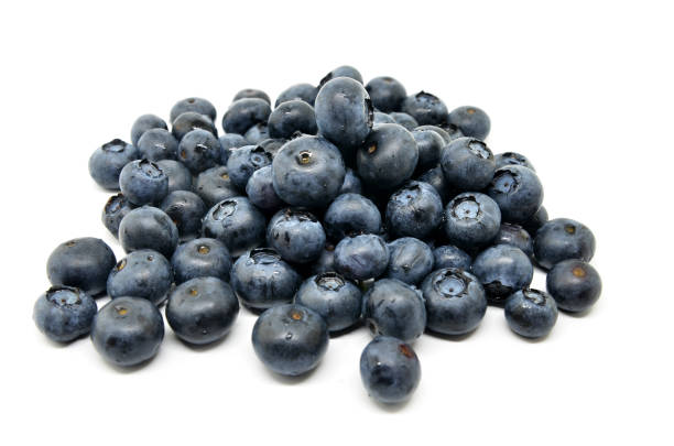 istock Tasty blueberries isolated 864544978
