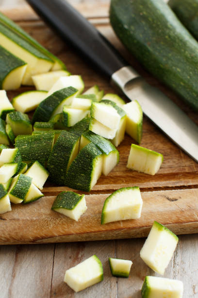 istock Fresh zucchini on wooden board 864546380