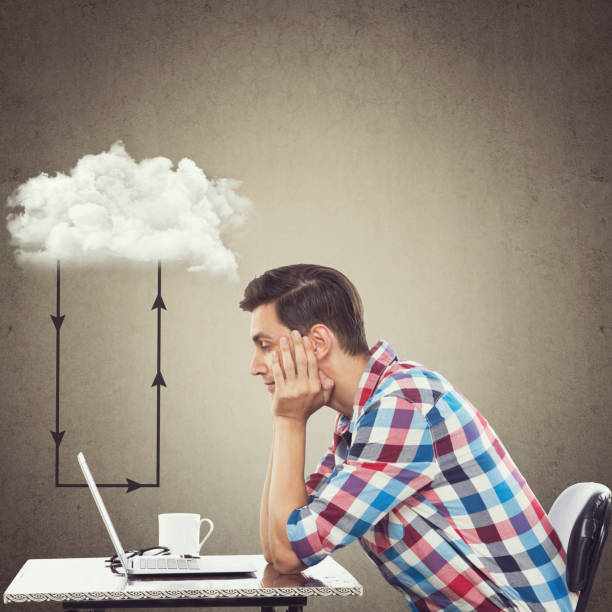 istock Businessman looking at laptop 864548160