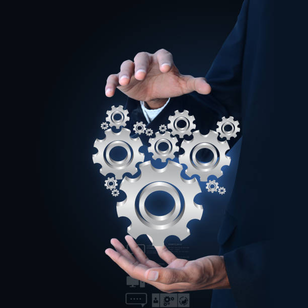 istock businessman showing gears cogs to success concept 864548896