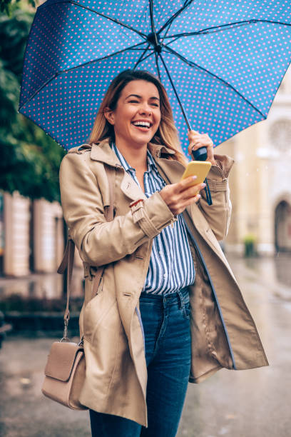 istock Some people sing, while others smile in the rain 864550164