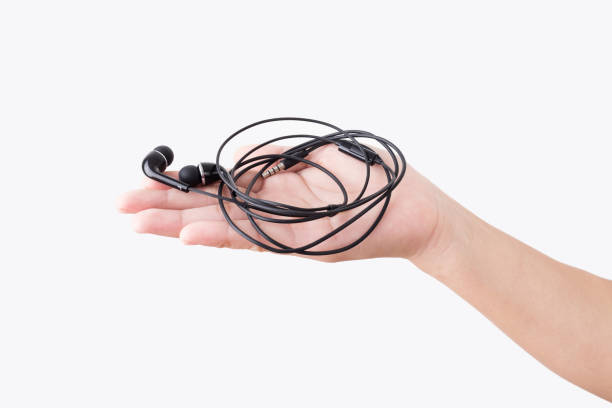 istock A woman hand holding earphones 864553466