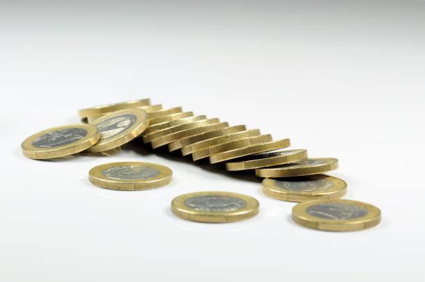 istock Stack of euro coins on white backround. 864556126
