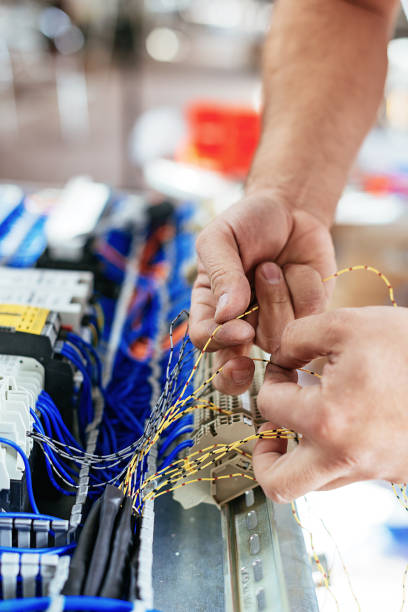 istock Electric engineer working on production line in car factory 864556880