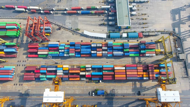 istock Logistics and transportation of Container Cargo ship and Cargo working crane bridge in shipyard 864557366