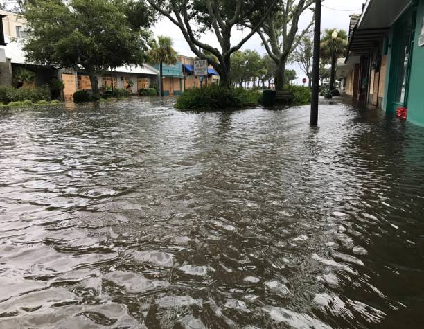 Main Street The Main Street of the Village area of St. Simons Island is flooded after hurricane Irma. saint simons island photos stock pictures, royalty-free photos & images