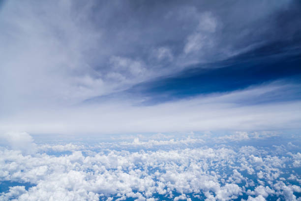 istock cloud blue sky aerial view from the airplane 864561724