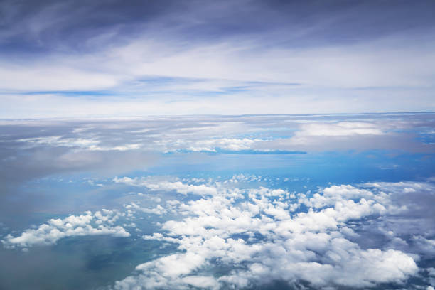 istock cloud blue sky aerial view from the airplane 864563410