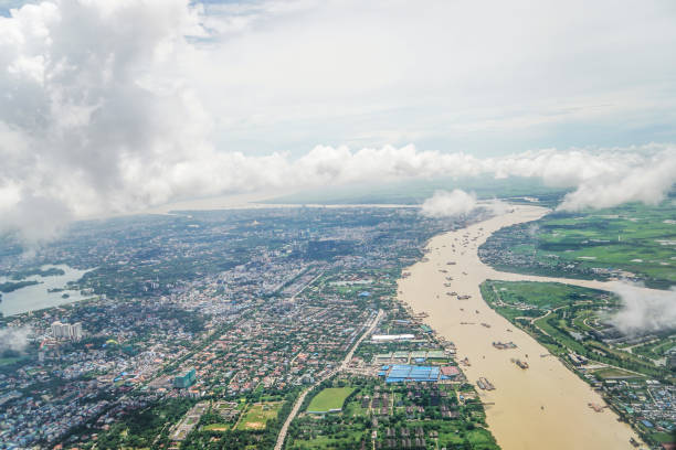 istock aerial view Myanmar landscape from the airplane, cloud, land, river, architecture 864564618