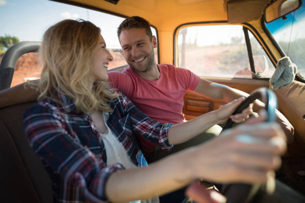 istock Couple sitting together in a car 864565186
