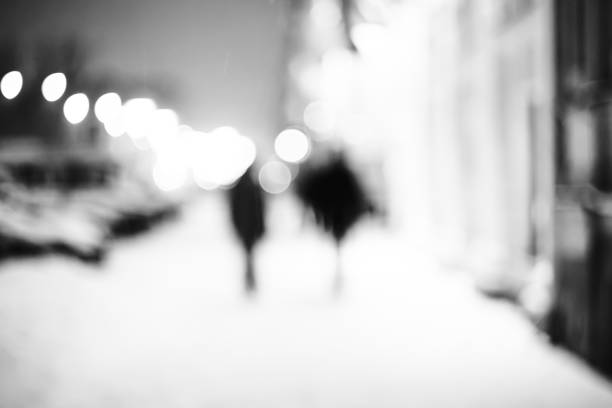 istock Silhouettes of two friends 864567548
