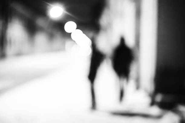 istock Silhouettes of two friends 864567650