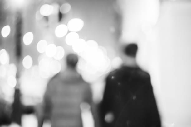 istock Silhouettes of two friends 864569072
