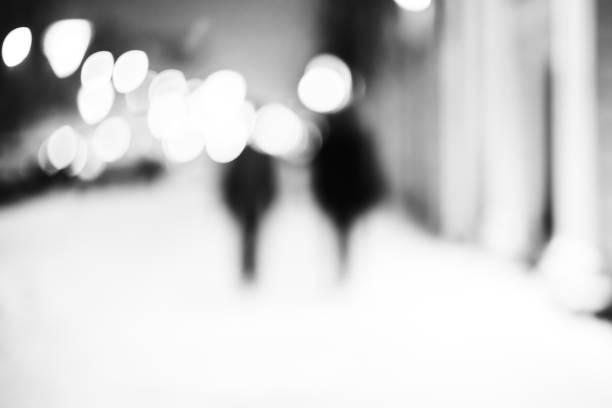 istock Silhouettes of two friends 864569880
