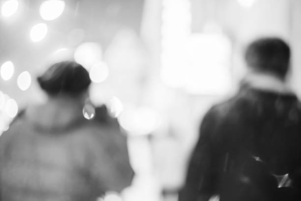 istock Silhouettes of two friends 864570348