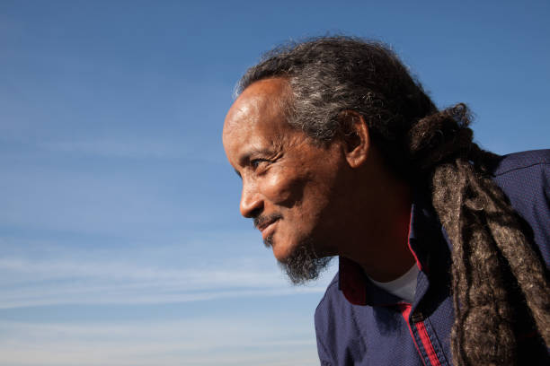 istock rasta man black portrait sky 864571334