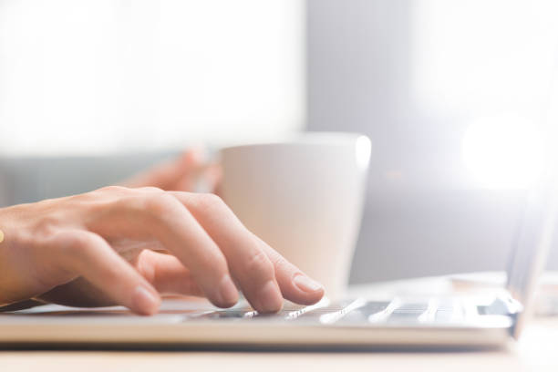 istock Hands working on the laptop, pressing buttons on keyboard 864577976