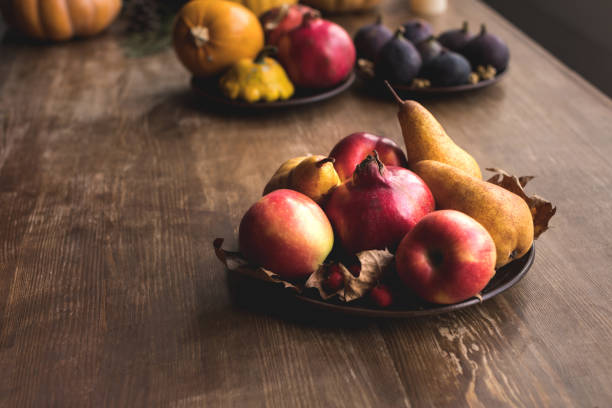 istock ripe autumn fruits on table 864581602