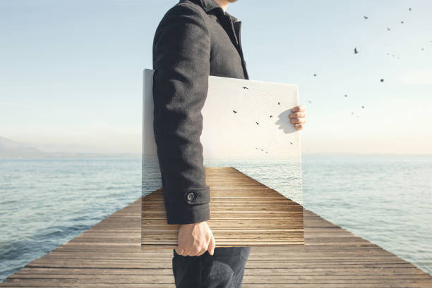 Man holding creative painting that represent the background