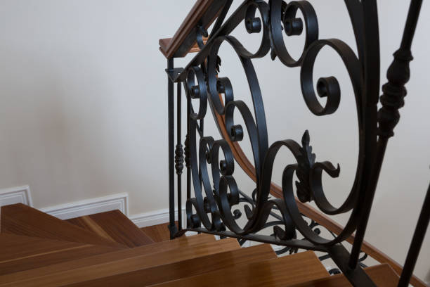 istock Interior wooden stairs with metal railing 864583828