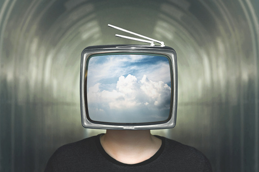 man with television heads in the clouds