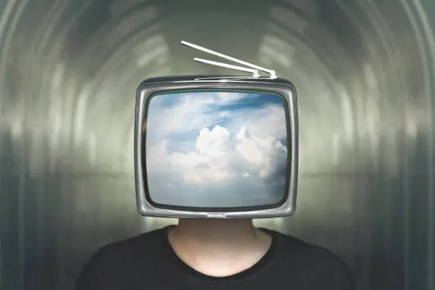 Photo of man with television heads in the clouds