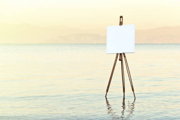 easel with white canvas in the water