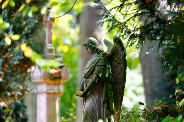 istock Angel statue on the Melaten graveyard, Cologne 864592478