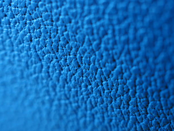 istock Macro blue calfskin leather with pores, diagonal little folded 864595486