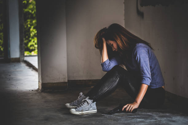 istock Sad women who are thinking about suicide committed by guns. 864598920