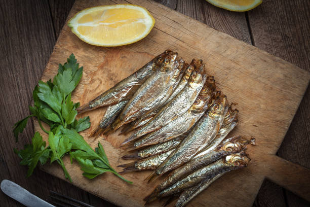 istock Tasty smoked sprats. 864602840