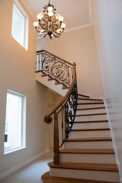 istock Staircase and chandelier at home 864606986