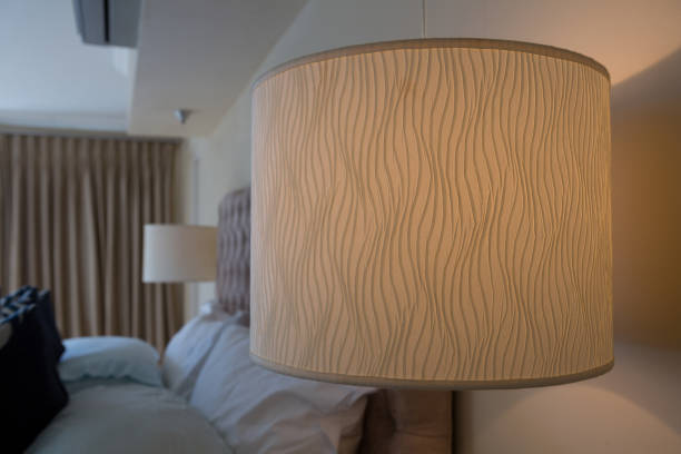 istock Illuminated lamp in bedroom 864614120